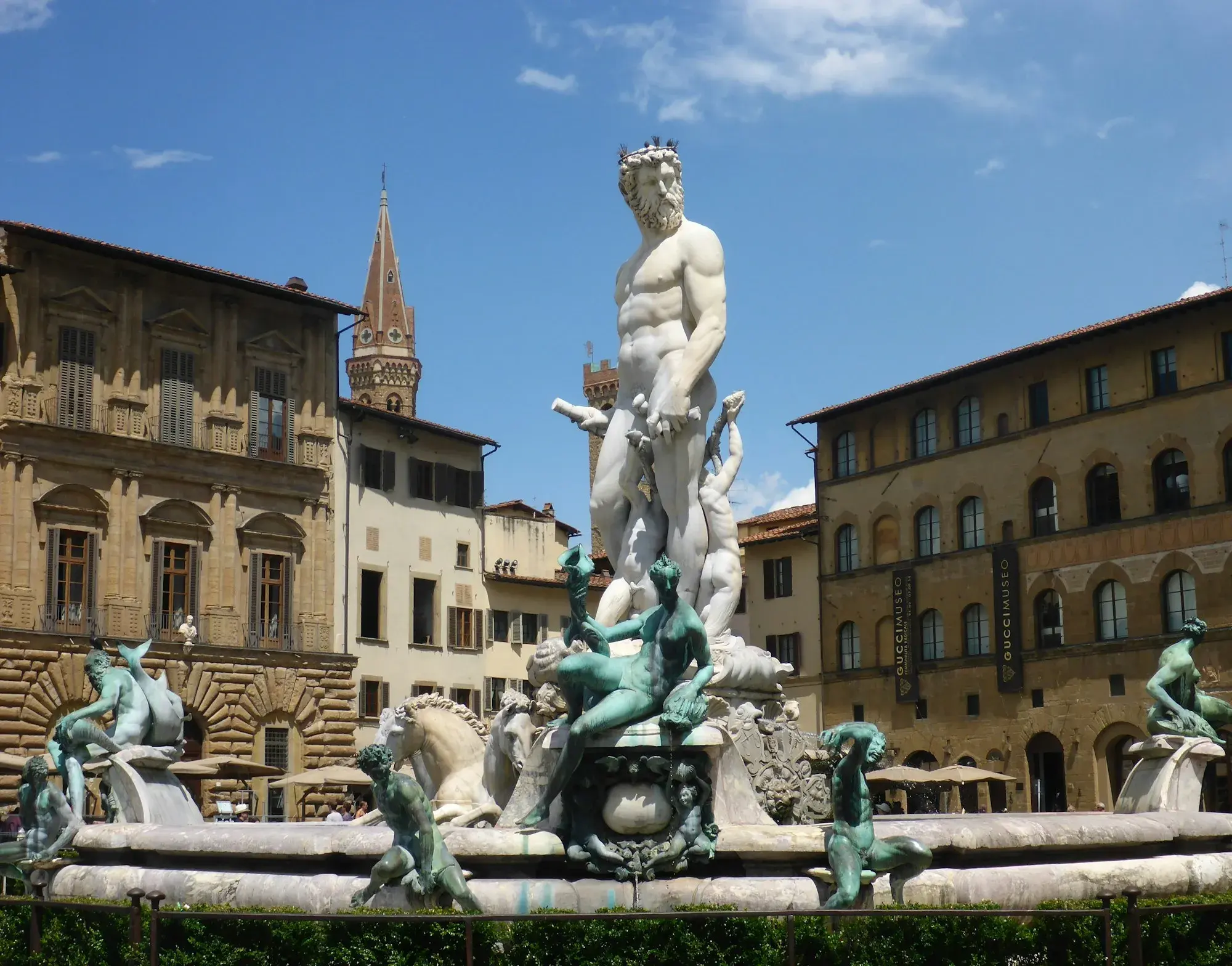 The Neptune Fountain in Piazza della Signoria, Florence, with historic buildings behind it
