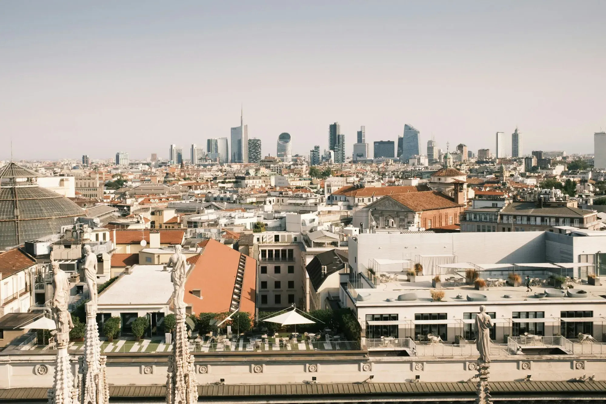 Milan's rooftops with the towers of Porta Nuova on the skyline