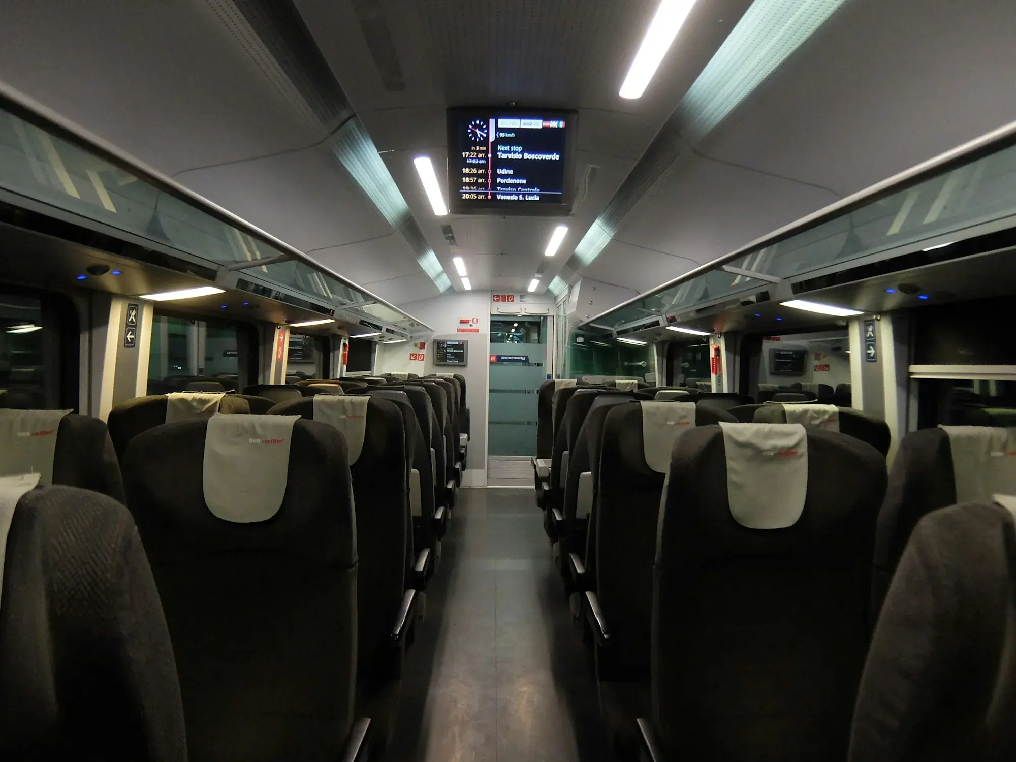 Rows of empty seats inside a train carriage at Tarvisio in Friuli Venezia Giulia