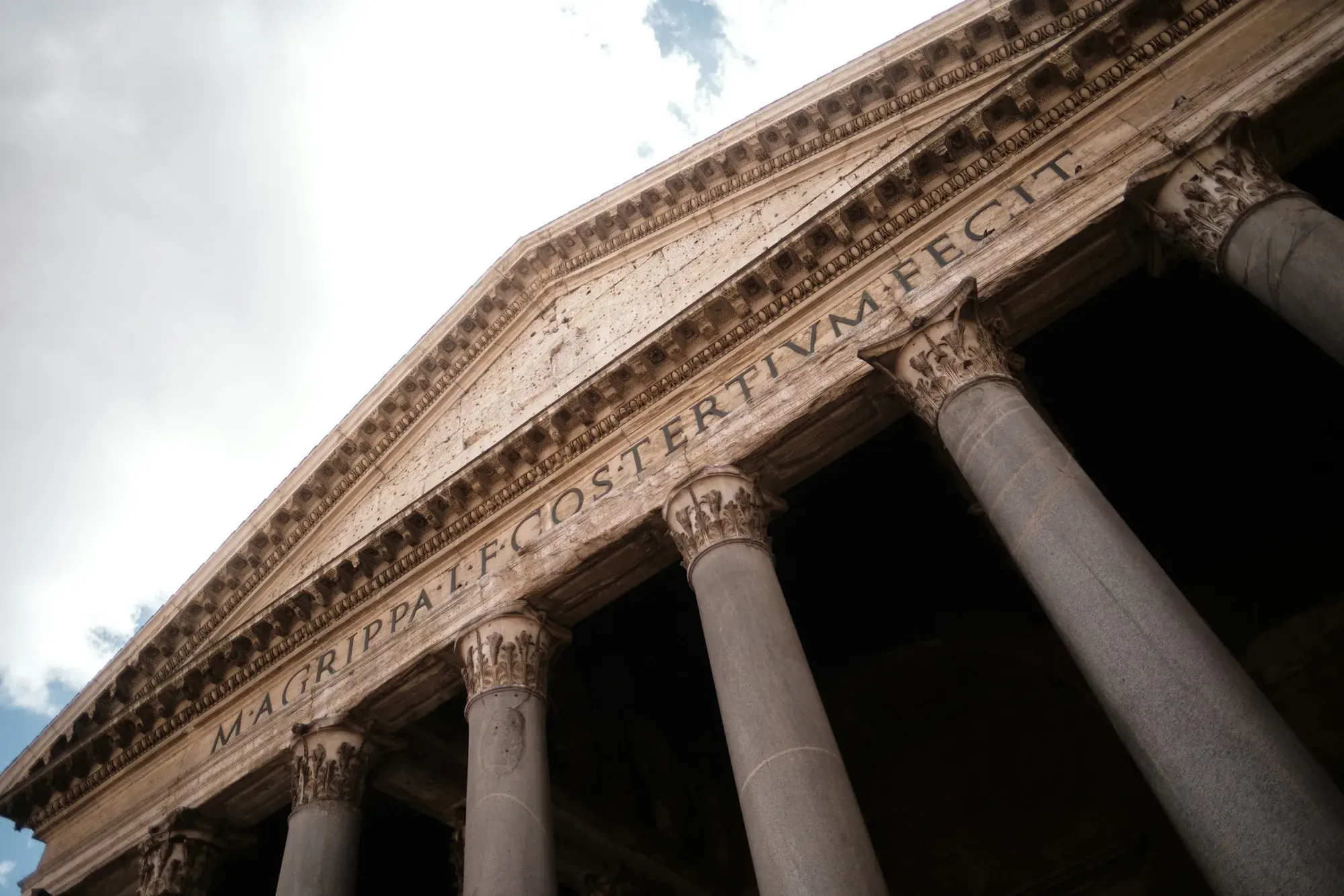 The ancient columns and pediment of the Pantheon on a quiet November day with almost no queue outside