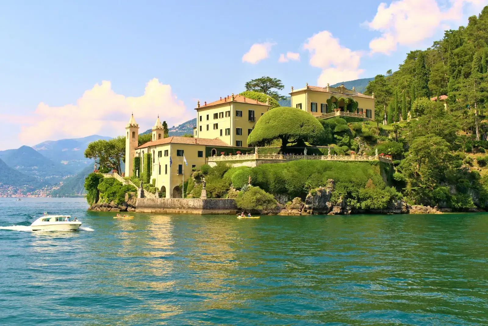 Villa del Balbianello on its wooded point above Lake Como near Lenno